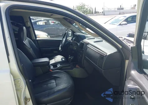 2004 Jeep Grand Cherokee Laredo z USA, uszkodzony, nr VIN 1J4GX48S84C284581